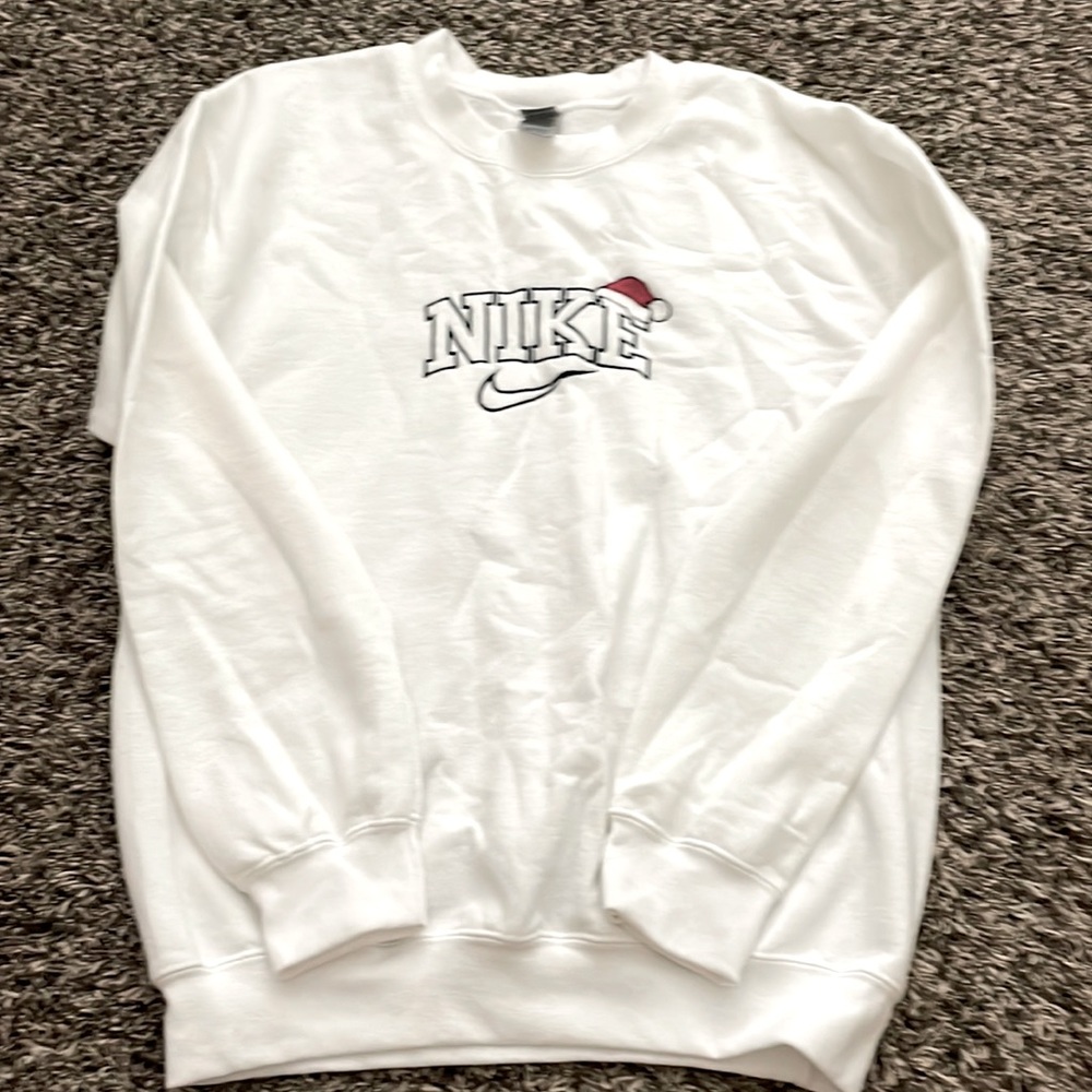 Custom Nike embroidered Christmas sweatshirt. Bought on Etsy. size S